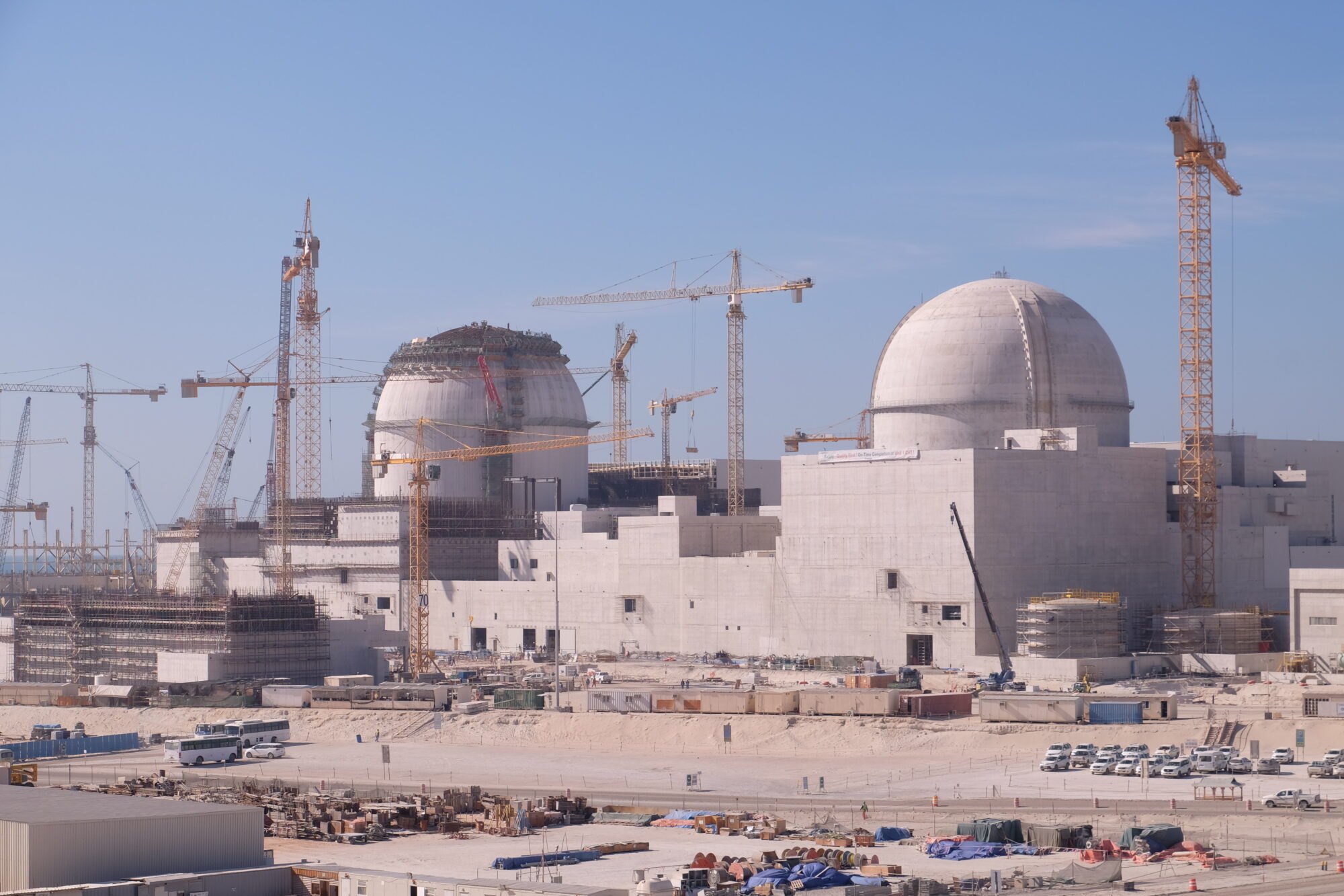The best known peaceful application of nuclear technology is nuclear power. Many countries see nuclear power as an affordable, reliable and clean source of energy that can help to mitigate the impact of climate change. It is a significant part of the world’s energy mix and its use is expected to grow in coming decades. The IAEA promotes the efficient, safe and secure use of nuclear power by supporting existing and new nuclear programmes around the world. It provides technical support, catalyses innovation and helps to build capacity in energy planning and analysis, and in nuclear information and knowledge management. The construction site of the Barakah nuclear power plant in the United Arab Emirates in 2016. The IAEA assists countries using or introducing nuclear power to do so safely, securely and sustainably.