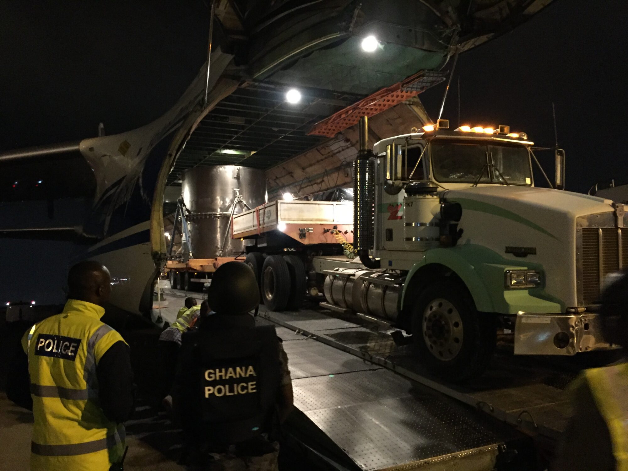 Ghanaian Police guard the loading operation at the Accra International Airport, Ghana.